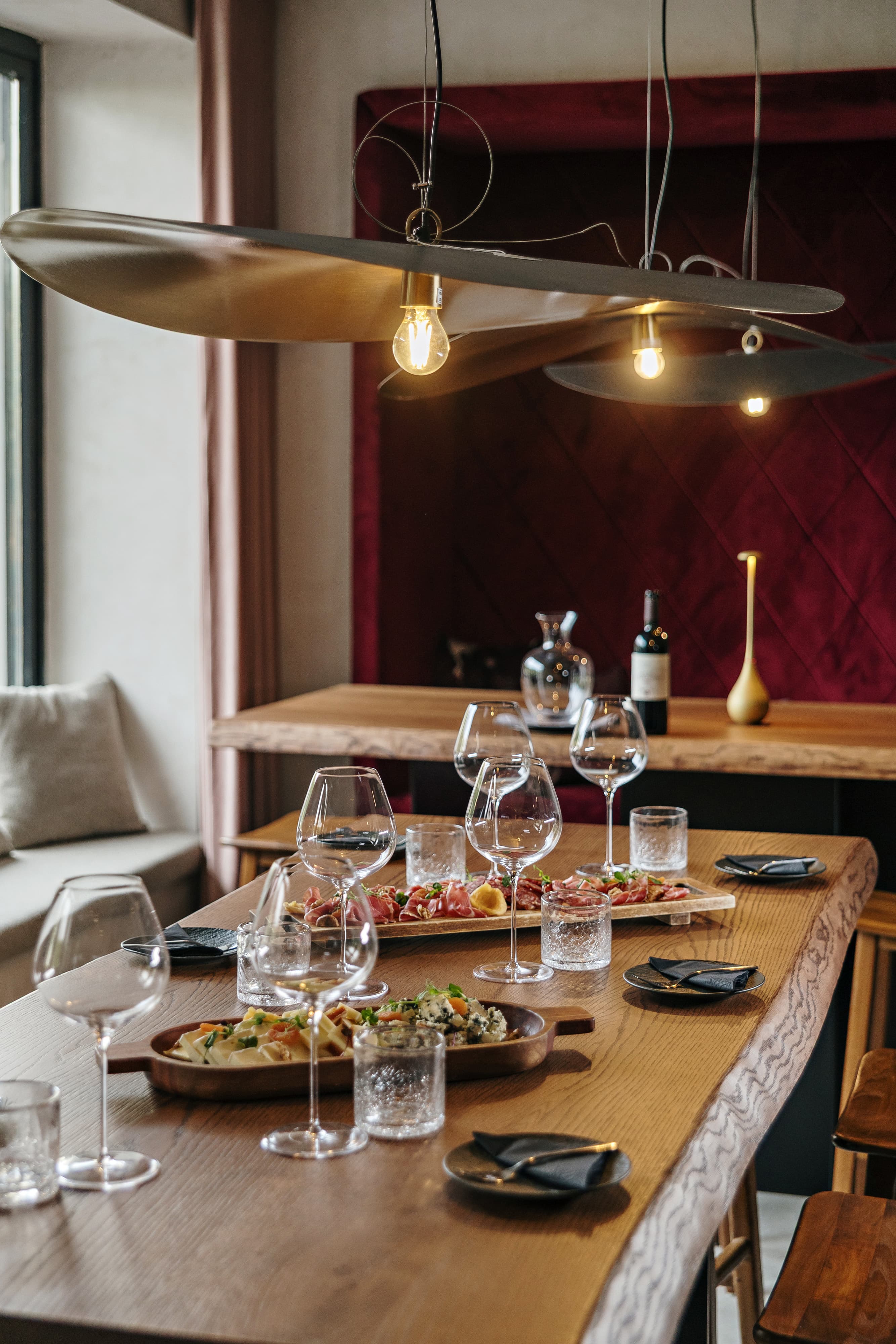 Table with snacks and wine glasses