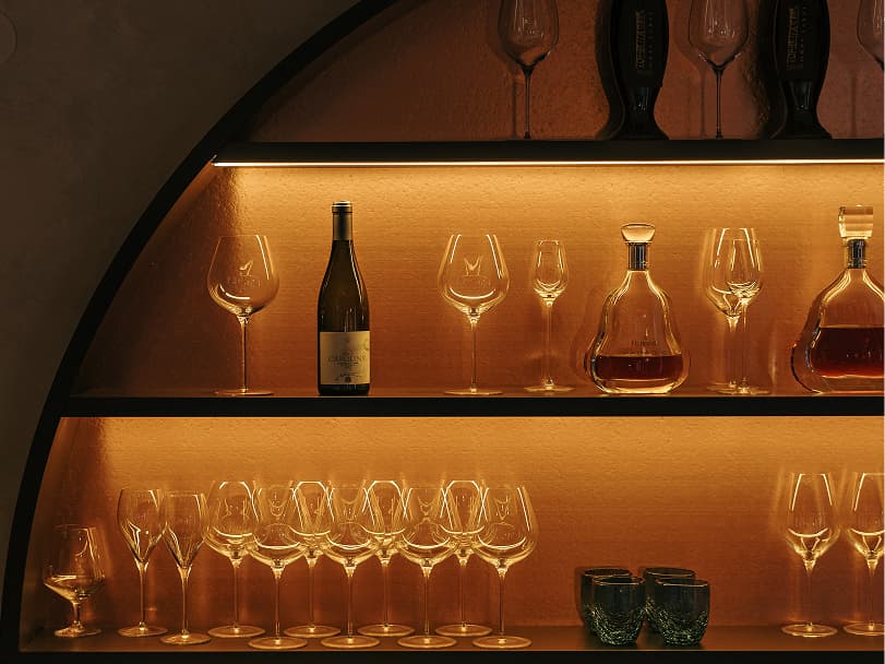 Wine and glasses on shelf
